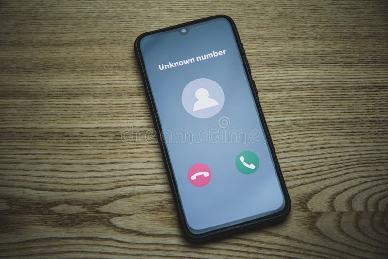 Incoming call from unknown number. Scam online on phone royalty free stock photo