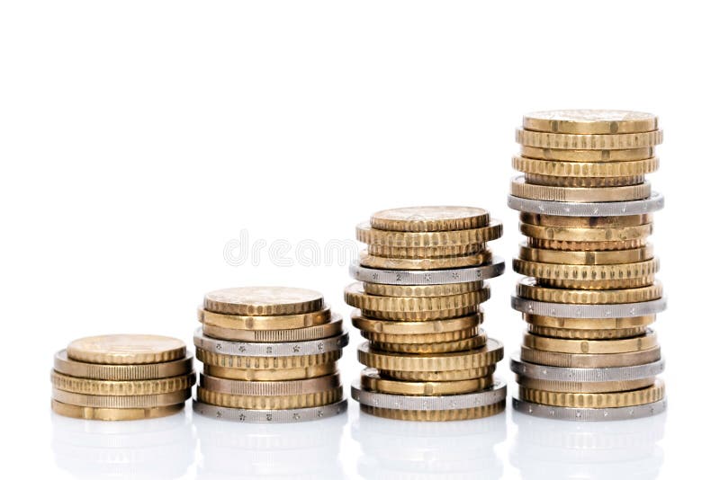 Increasing stacks of coins stock photography