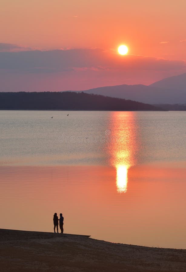 Beautiful Nature Background.Orange Wallpaper.Water Landscape.Art Photography.Sky,clouds,lake.Mountain,trees.Relaxation,pond,sunset