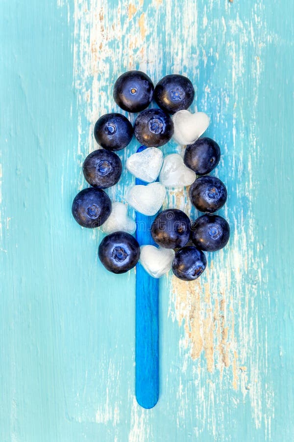 Incredients for a homemade blueberry water-ice or icecream