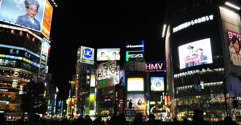 Nighttime at the famous Shibuya Crossing in Tokyo, Japan. Nighttime at the famous Shibuya Crossing in Tokyo, Japan.