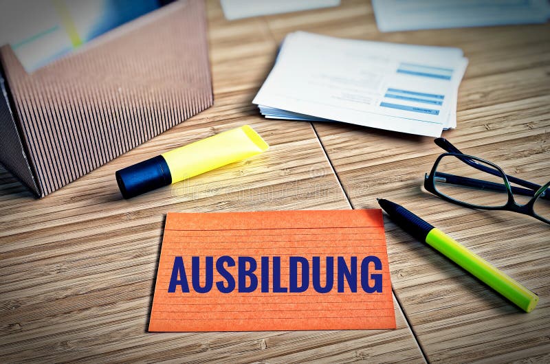 Index cards with legal issues with glasses, pen and bamboo with the german word Ausbildung in english Education. royalty free stock image Index cards with legal issues with glasses, pen and bamboo with the german word Ausbildung in english Education. royalty free stock image