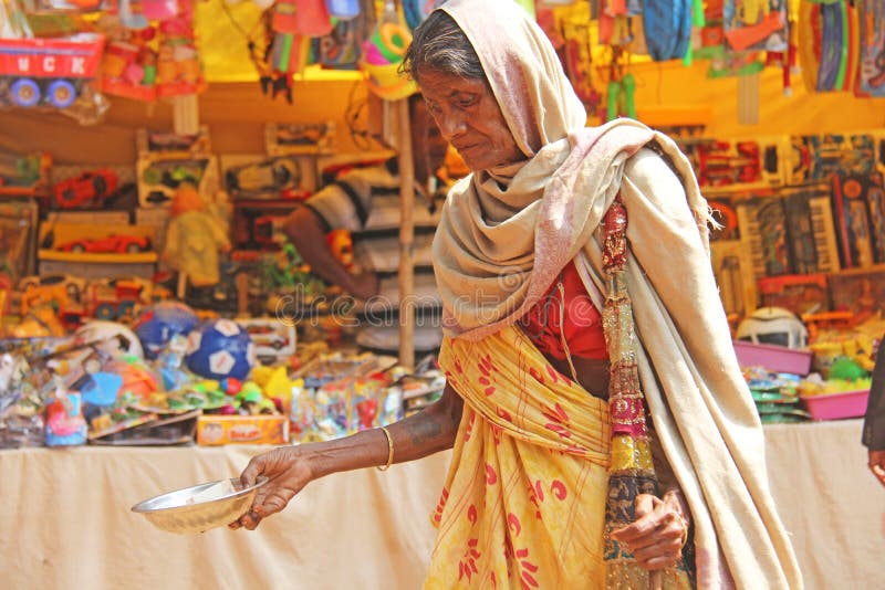 India, GOA, January 28, 2018. Poor Woman Asks for Money on the Street in India. a Beggar Woman with an Outstretched Hand Editorial Stock Image - Image of looking, beggars: 139818229