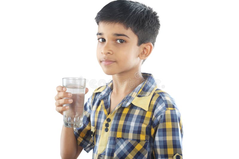 Portrait of Indian boy drinking water