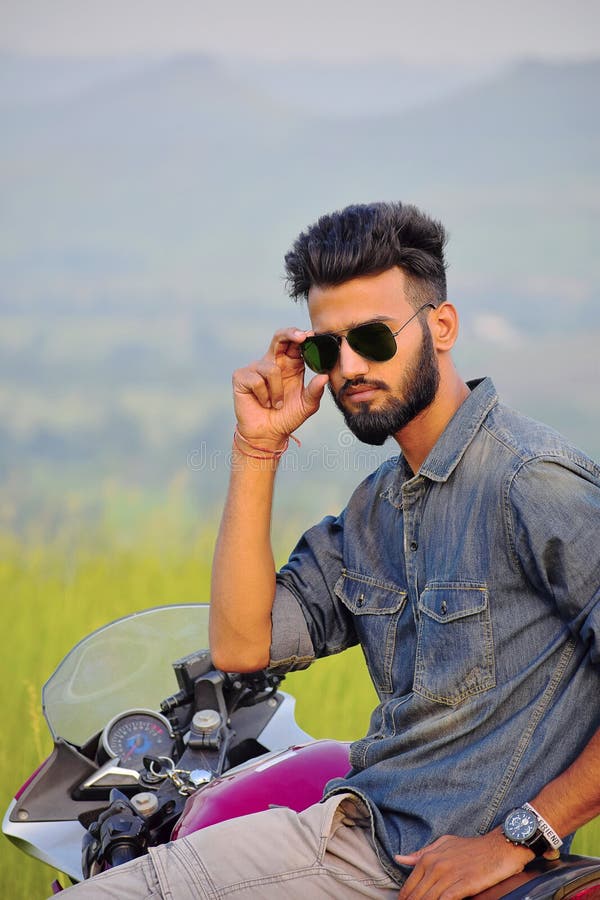Indian Boy Posing with Motorbike , Pune, Maharashtra. Stock Photo - Image  of closeup, beard: 112802076