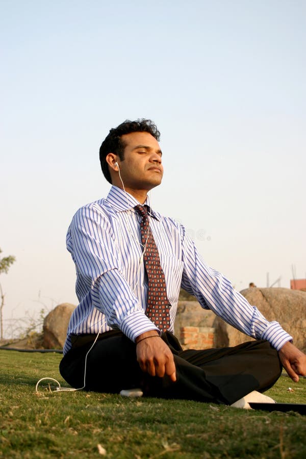 indian business man meditating