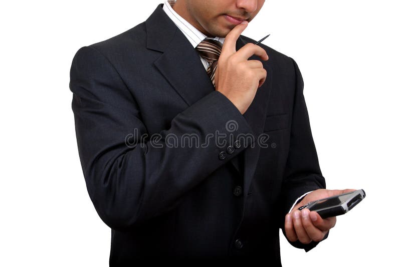 Indian business man using pda (3) royalty free stock photography