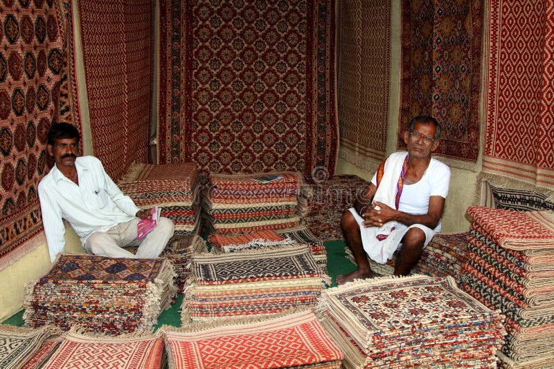 Indian carpet vendor editorial photography. Image of tradition 21636557