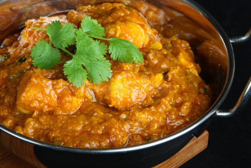 Indian Chicken Dansak Curry Stock Photo - Image of background, black ...