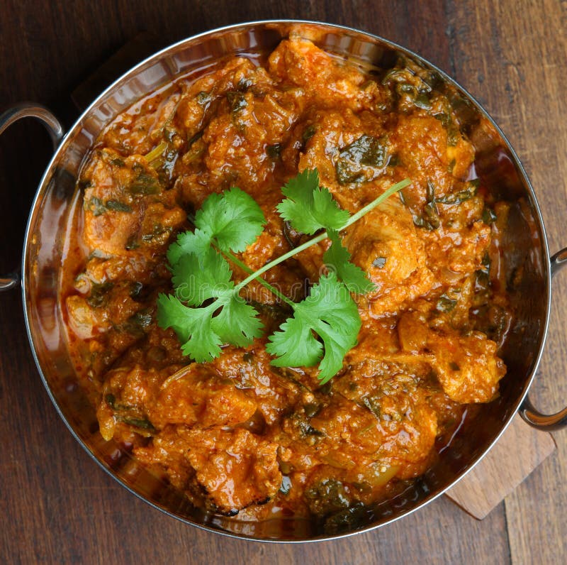Chicken Madras Curry in Black Bowl on Dark Slate Table Top. Indian ...