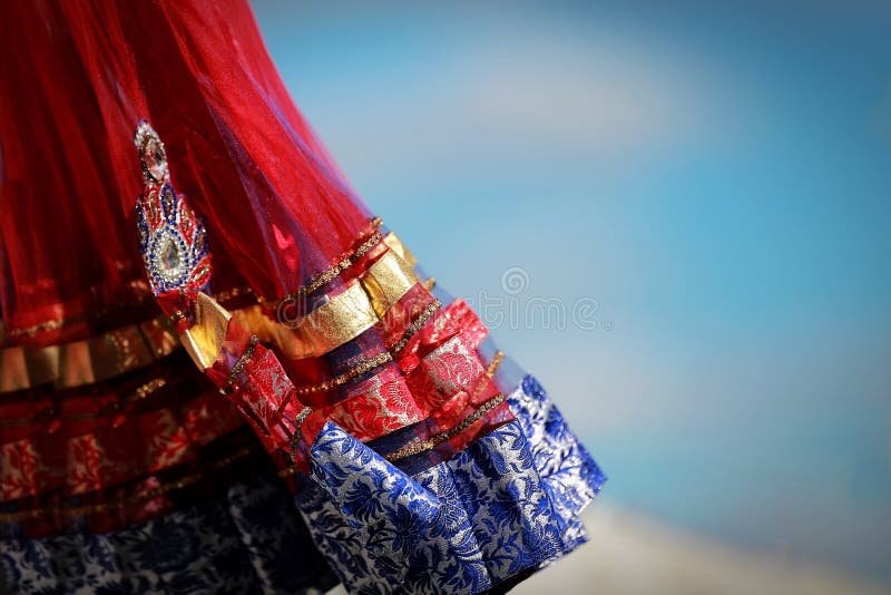 Indian colorful dress with beads and crystals at culture festival market