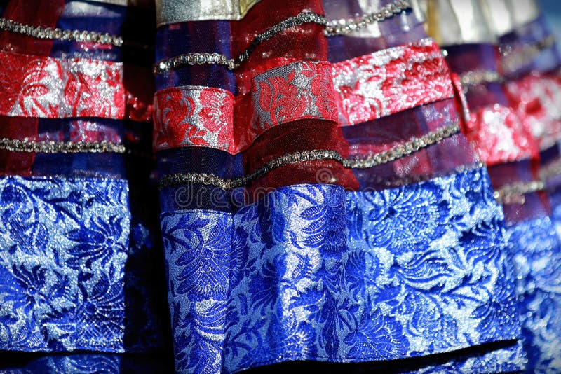 Indian colorful dress with beads and crystals at culture festival market stand