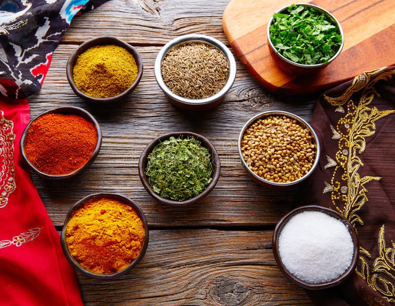 Indian Cuisine Spices Mix As Coriander Curry Stock Photo - Image of