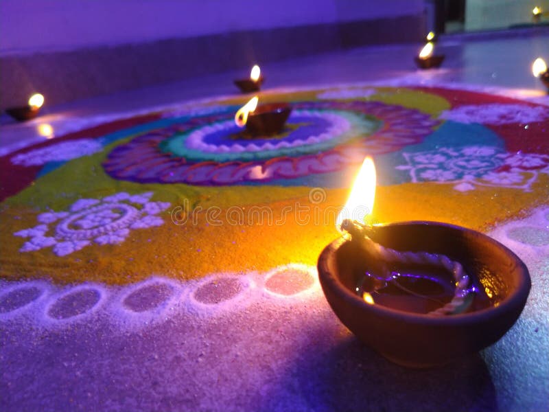 Indian festival diwali, celebrated with joy, decorated with rangoli and diyas.