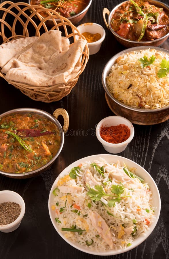 Indian food ;curries, chapathi, fried rice and biriyani