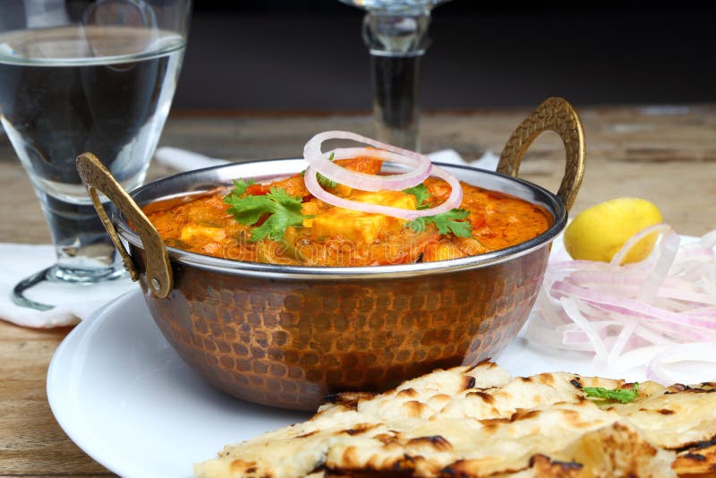 Indian Food or Indian Curry in a Copper Brass Serving Bowl Stock Image