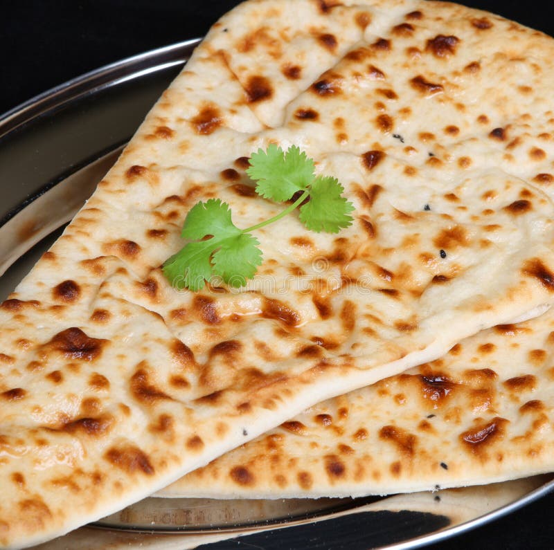 Indian naan bread with coriander. Indian naan bread with coriander