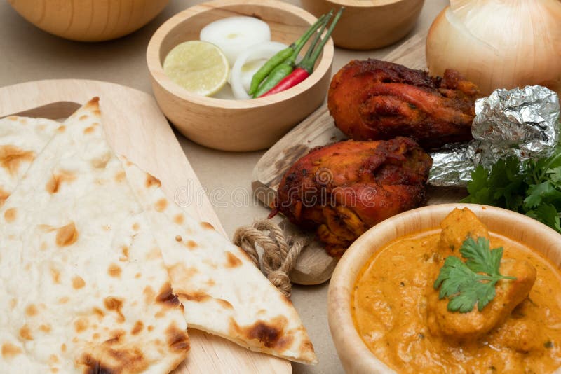 Indian food Tandoori chicken with Naan bread and Butter chicken