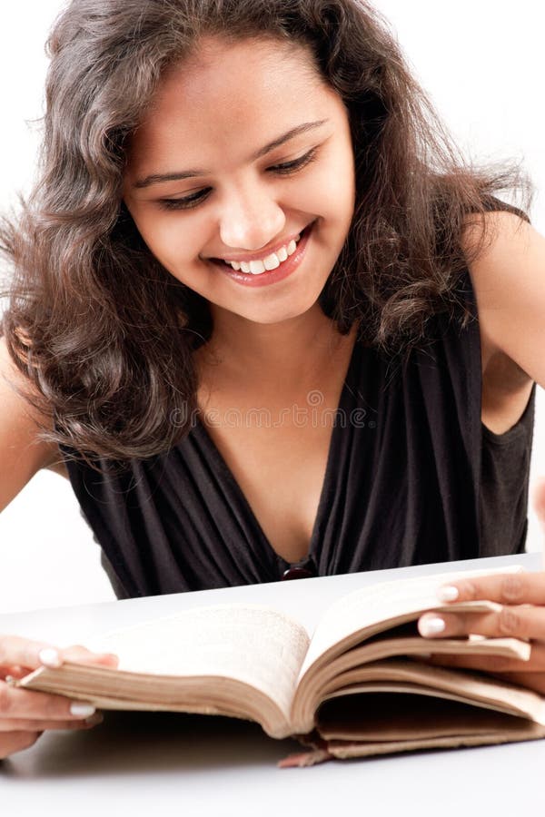 Indian girl enjoing reading book