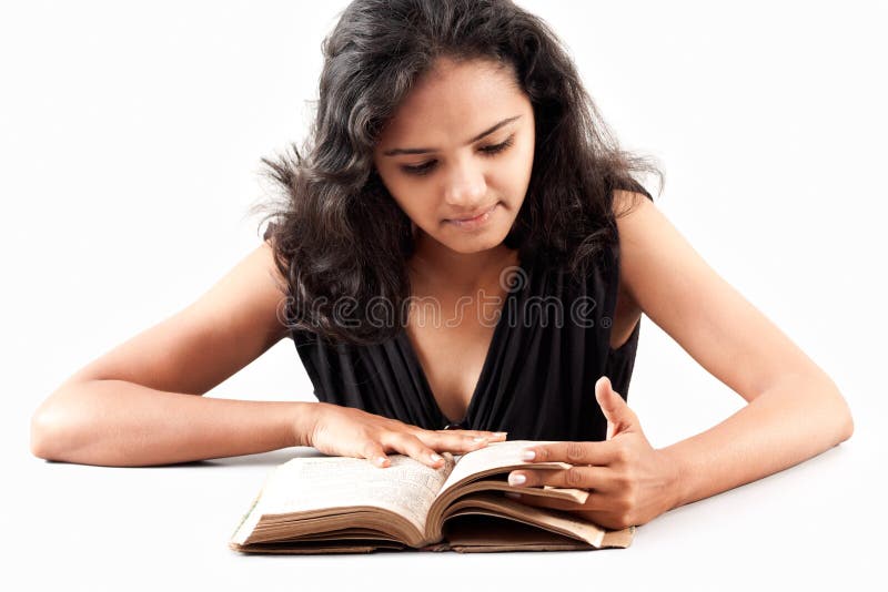 Indian girl enjoing reading book