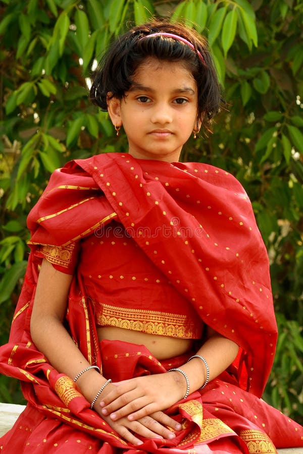 Indian girl in red dress stock photo. Image of closeup - 4722358