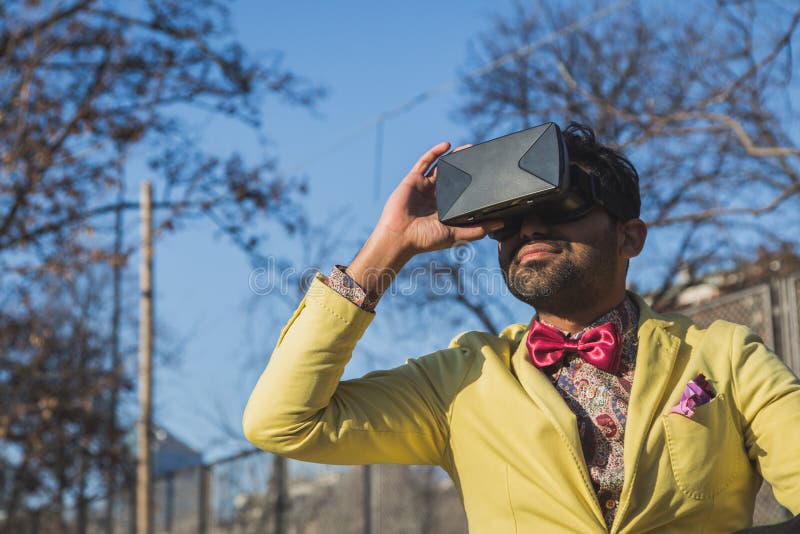 Indian handsome man wearing virtual reality headset royalty free stock photography Indian handsome man wearing virtual reality headset royalty free stock photography