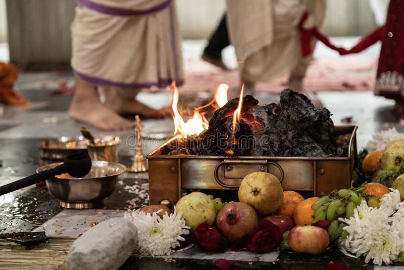 indian-hindu-traditional-pooja-vedic-fire-ceremony-called-yagya-indian-wedding-vivah-yagya-items-indian-yajna-ritual-179313599.jpg