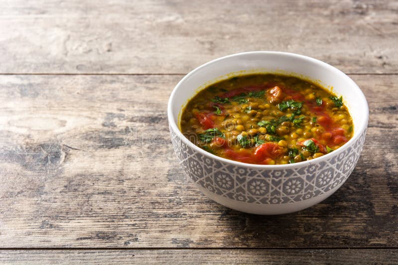 Indian Lentil Soup Dal Dhal in a Bowl on Wooden Table. Stock Photo ...