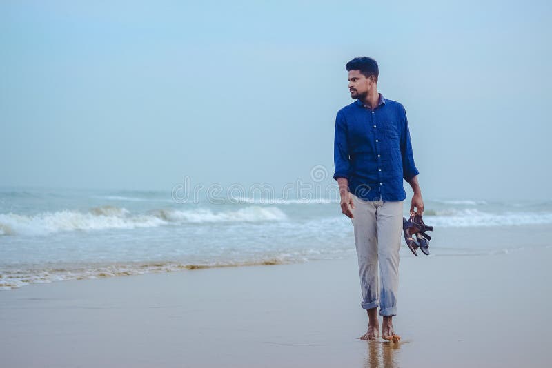 Indian Men Model Walking on Beach Sea View Background with Space for Copy  Text. Handsome and Confident Men Stock Photo - Image of formal, blue:  199994364