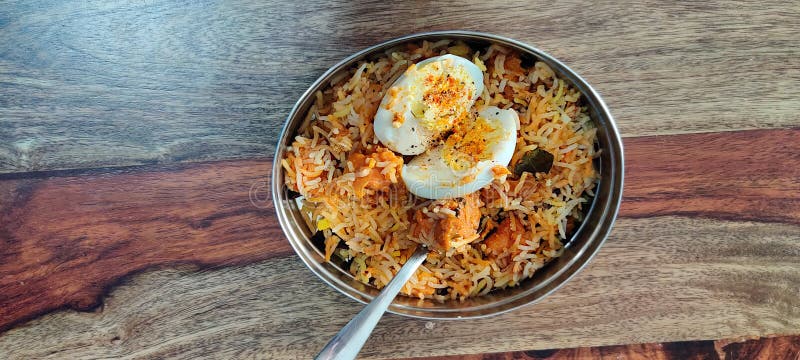Indian Mini Chicken Biryani served in a small steel bowl. Chicken dum biryani stock images, royalty-free photos and pictures