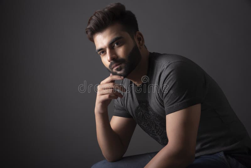 Indian model seating in pensive mood. stock images Indian model seating in pensive mood. stock images