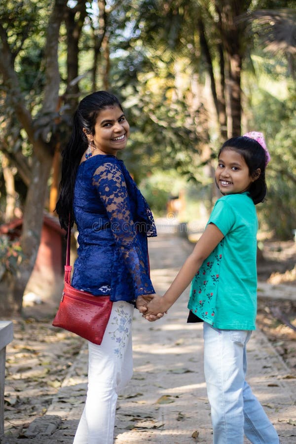 Mother and daughter in same outfits Stock Photo by ©lenanet 81396454