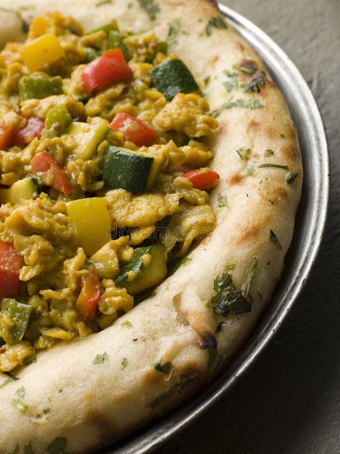 Plate of Indian Scrambled Eggs and Naan Bread