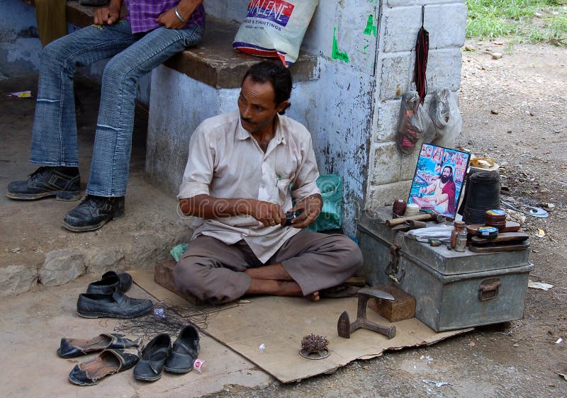 Indian shoe clener editorial stock image. Image of employer 11554189