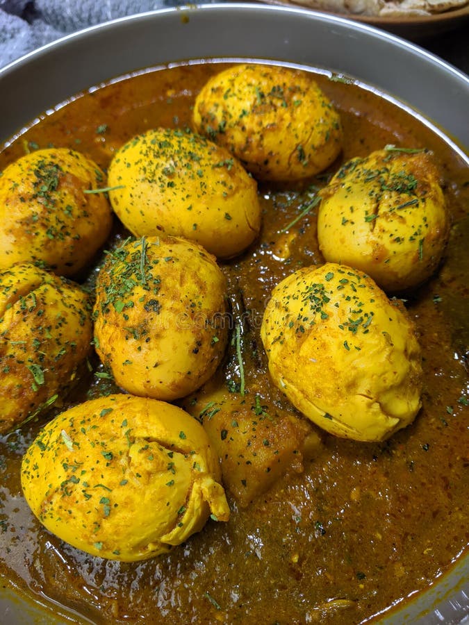 An Indian Spread of Spicy Egg Curry or Egg Masala in a Bowl Stock Image