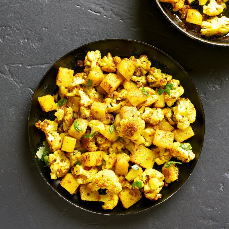 Indian Style Cauliflower with Potatoes Stock Photo - Image of dinner