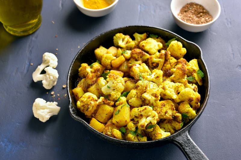 Indian Style Cauliflower with Potatoes Stock Image - Image of grilled