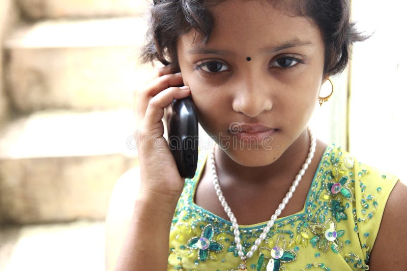 Indian Teenage Girl On a Cell Phone