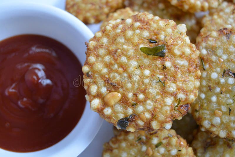 Indian traditional fried food Sabudana vada / Sago Cutlet top view. stock photos Indian traditional fried food Sabudana vada / Sago Cutlet top view. stock photos