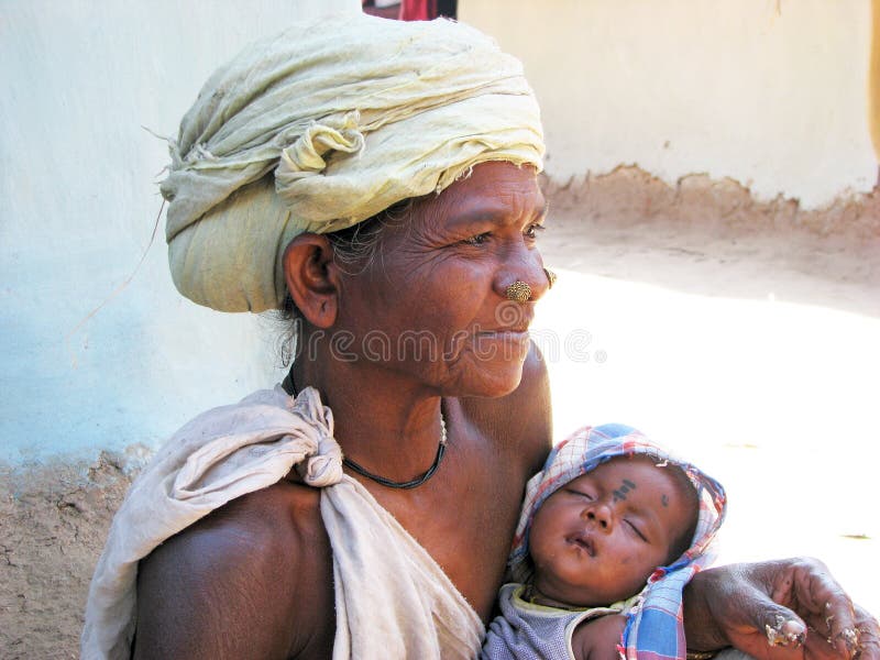 Indian tribal grandmother and grandson royalty free stock photo