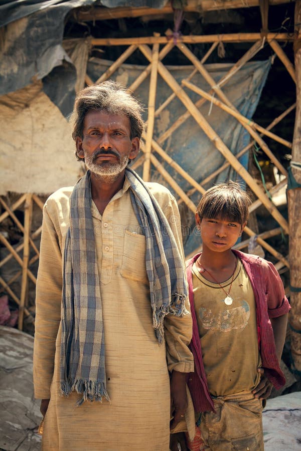 Indian villager man with son