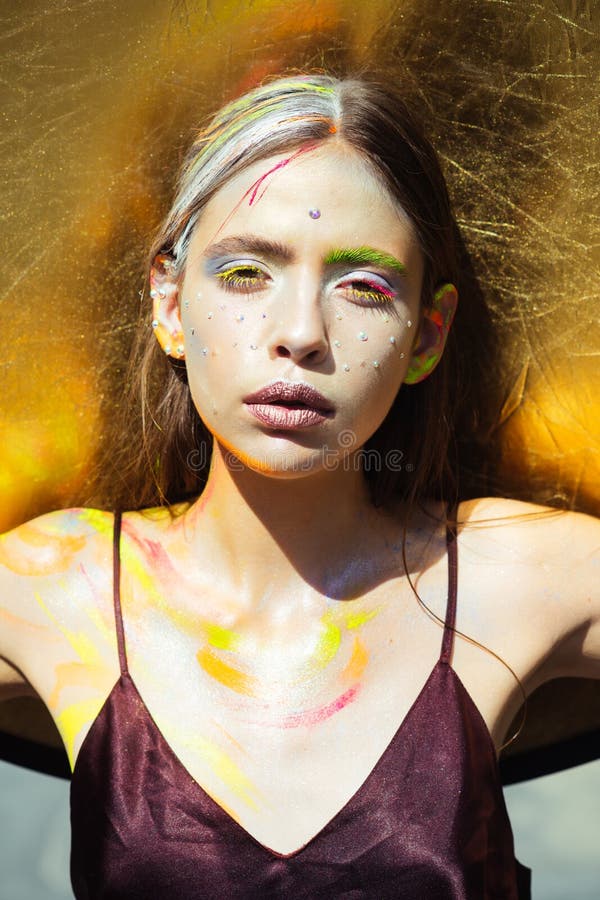 Indian woman with colorful makeup face, body art royalty free stock photo Indian woman with colorful makeup face, body art royalty free stock photo