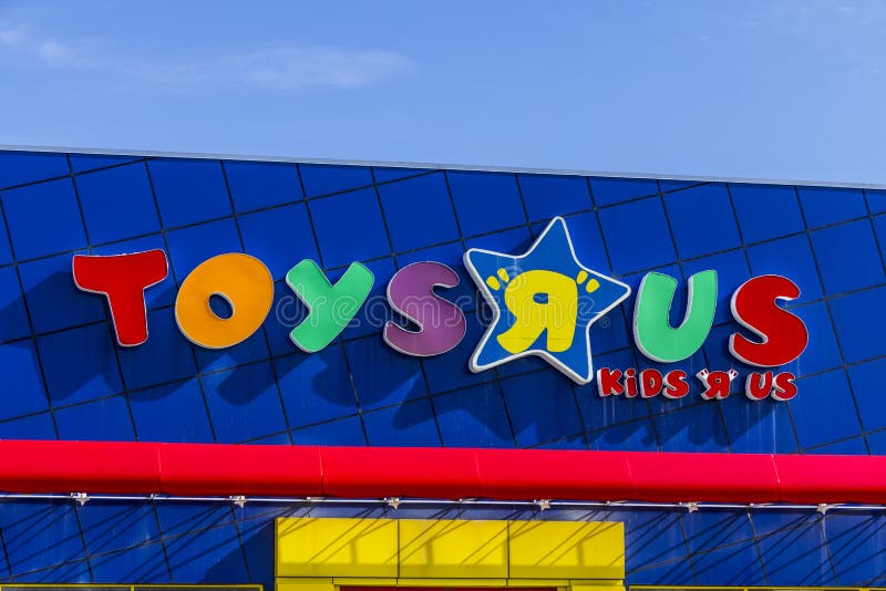 Indianapolis - Circa February 2017: Toys `R` Us Retail Strip Mall Location. Toys `R` Us is a Children`s Toy Retailer II