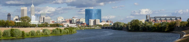 Panoramic view of downtown Indianapolis, Indiana skyline from the White River. 5 pictures were put together to create a large panoramic picture. Panoramic view of downtown Indianapolis, Indiana skyline from the White River. 5 pictures were put together to create a large panoramic picture