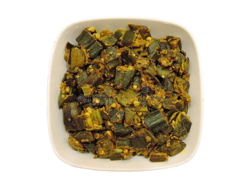 Okra or bhindi fried in oil and served in a bowl. It is also known as ladies fingers. Okra or bhindi fried in oil and served in a bowl. It is also known as ladies fingers.