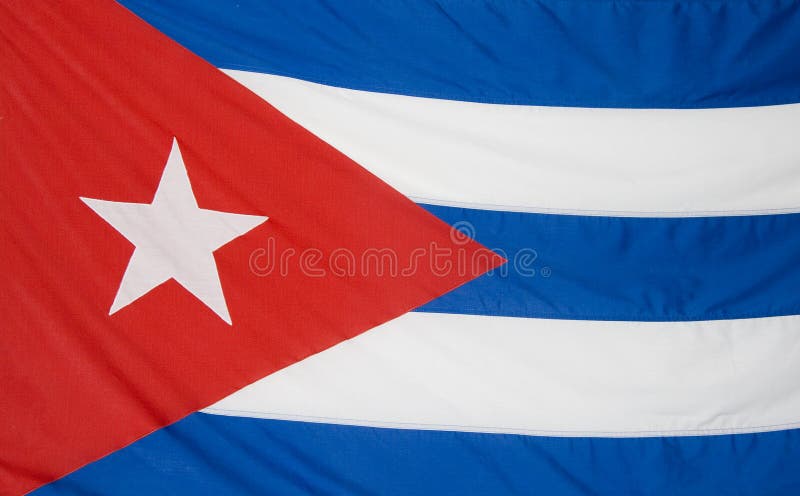 Cuban flag detail background, blue and white stripes and the red triangle with a white sta. Cuban flag detail background, blue and white stripes and the red triangle with a white sta