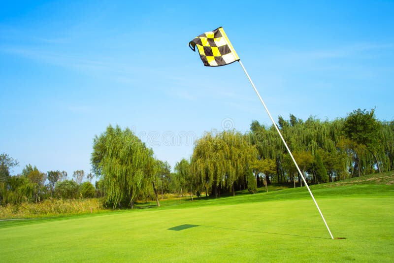 Golf flag in the morning. Golf flag in the morning