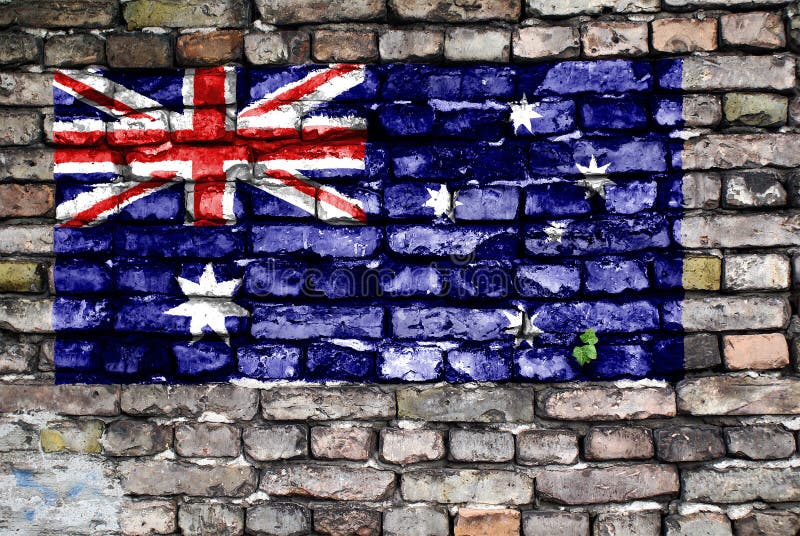 Flag of Australia painted on an old brick wall with small ivy plant growing out of a crack. Flag of Australia painted on an old brick wall with small ivy plant growing out of a crack.