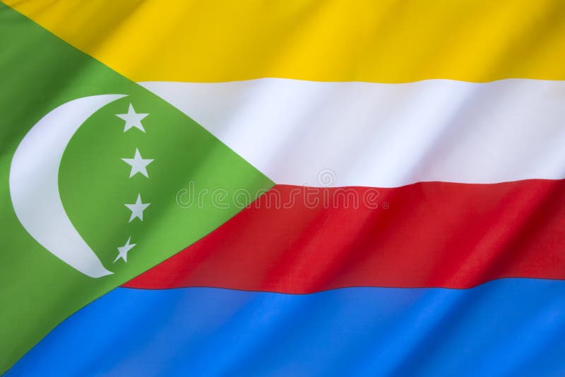 Flag of the Union of Comoros - designed in 2001 and officially adopted on 7th January 2002. Comoros is a group of islands in the Indian Ocean north of Madagascar. Flag of the Union of Comoros - designed in 2001 and officially adopted on 7th January 2002. Comoros is a group of islands in the Indian Ocean north of Madagascar.