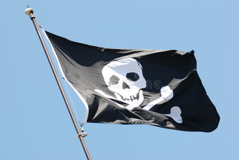 Indicateur noir de pirate gai de Roger photographie stock libre de droits Indicateur noir de pirate gai de Roger photographie stock libre de droits